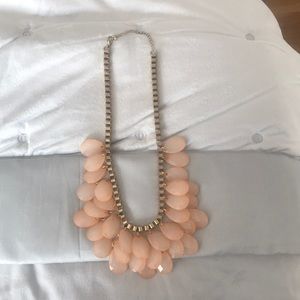 Goldtone peach faceted dangle necklace